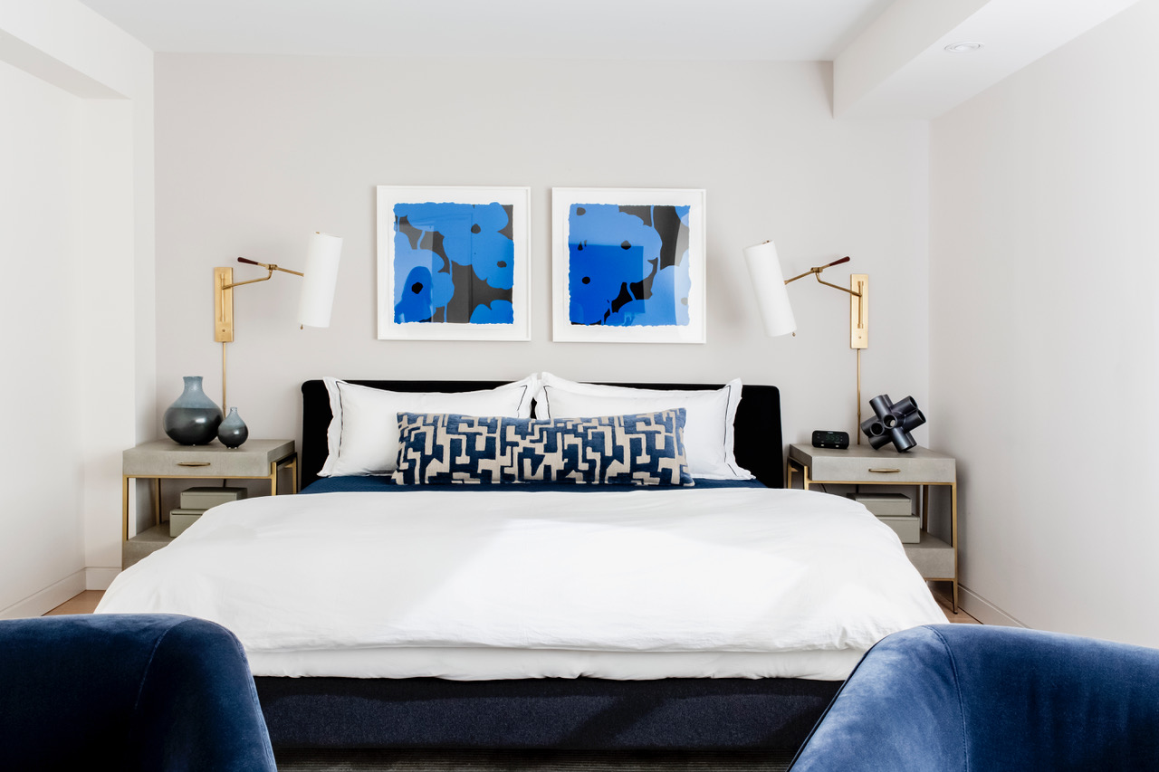 Lifestyles & Interiors, white bed and blue art